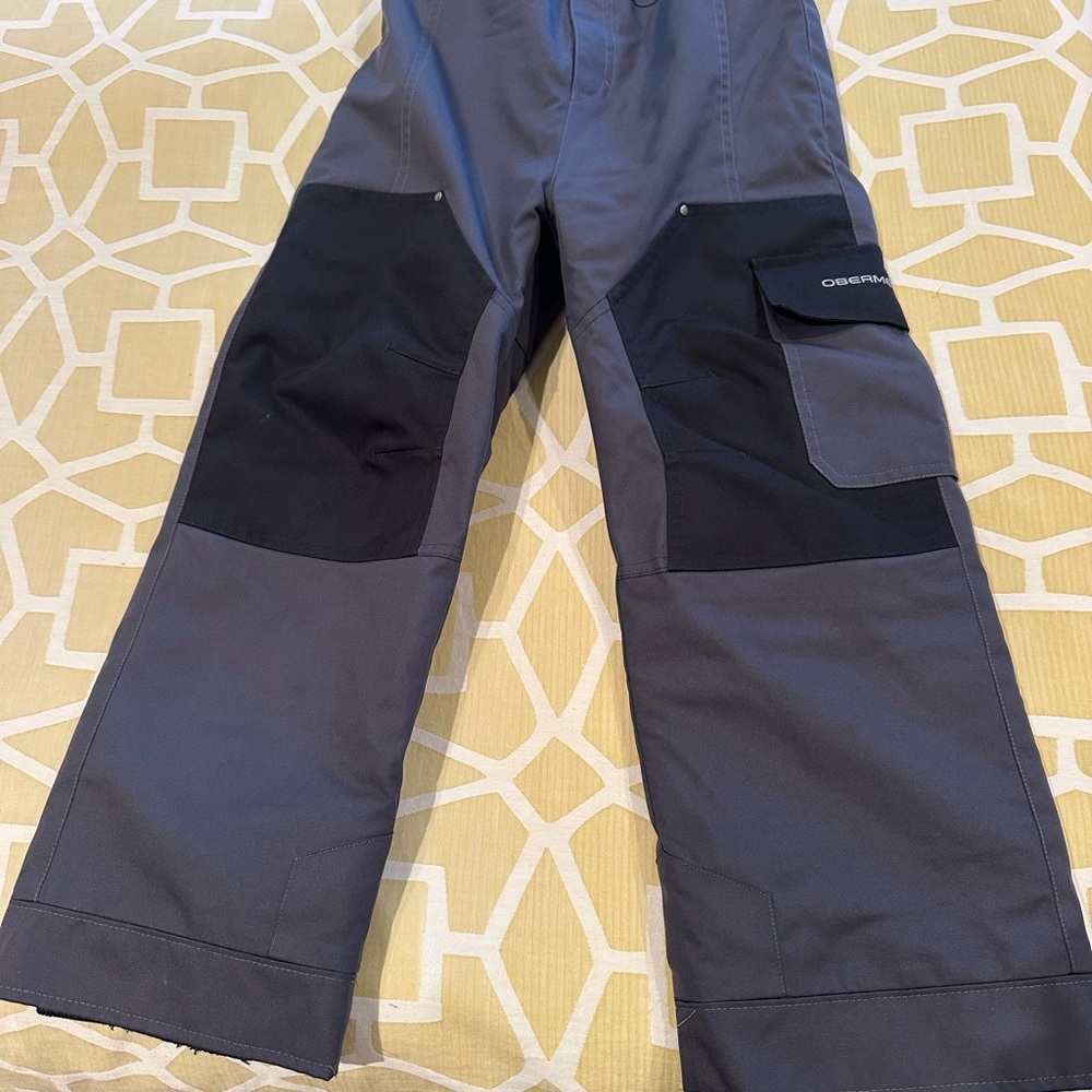 Gray and black snow pants with Black Knee Patches and Durable Fabric from